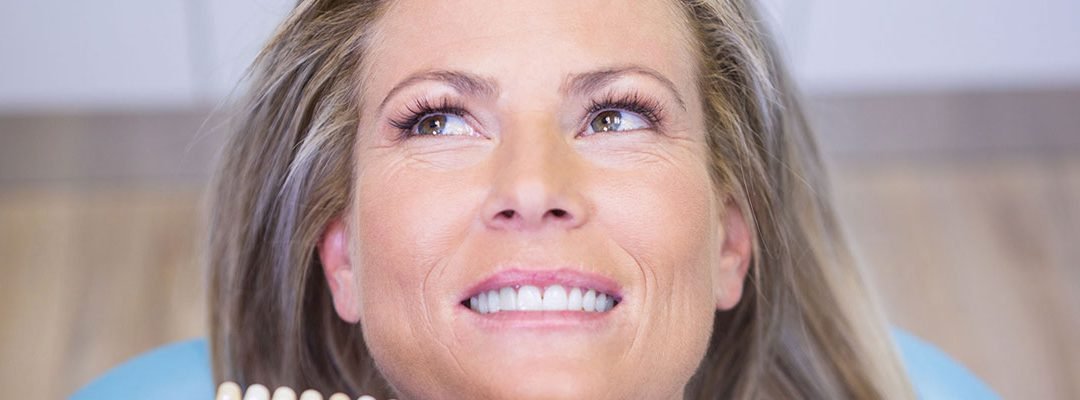 INSTANTLY IMPROVE YOUR SMILE WITH PORCELAIN VENEERS